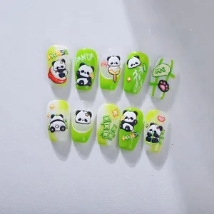 Detailed close-up of cute panda theme nail stickers with green bamboo and 3D relief patterns