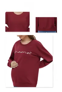 Detail of burgundy maternity sweatshirt featuring mama heart print and ribbed neck cuffs