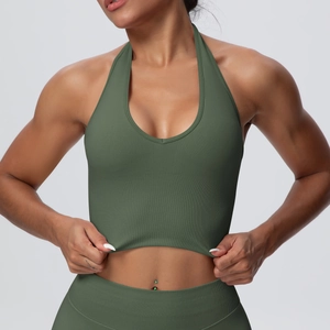 Detail view of olive green ribbed high-stretch knit fabric on halter sports crop top