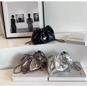Three metallic ruched bucket bags in silver, black and bronze with pearl chain charms