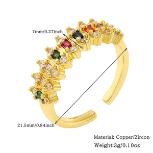 Detailed view of gold copper ring with colorful zircons and precise measurements