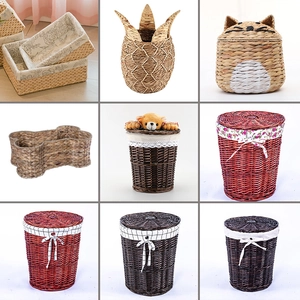 Handwoven wicker storage baskets in various animal and geometric shapes with fabric linings
