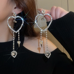 Elegant heart-shaped silver tassel earrings with sparkling rhinestones for parties