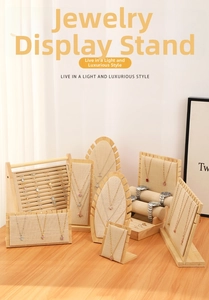 Bamboo and linen jewelry display set featuring necklace stand and ring tray holder