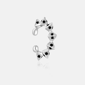 Detailed view of 925 silver ear cuff with black stones and pyramid studs design