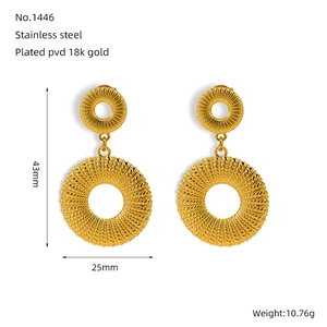 Detail of 18K gold plated stainless steel earrings with woven texture and size specs