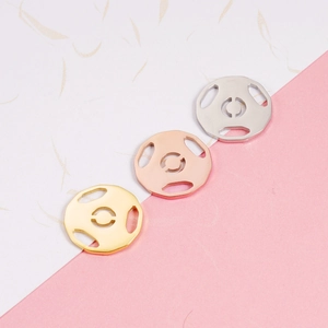 Mirror polished stainless steel football pendants in gold, rose gold and silver finish