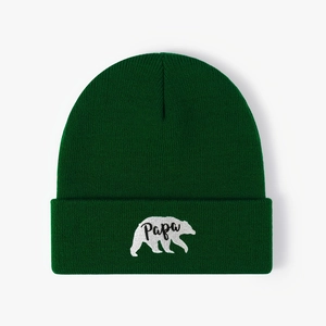 Dark green knitted beanie featuring a white polar bear embroidery with Papa text