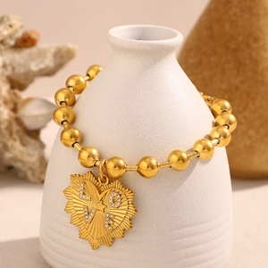 Bracciale a sfere placcato oro 18K con ciondolo a cuore LOVE su vaso bianco