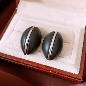 French vintage matte black oval earrings with silver pinstripe inlay in a gift box