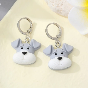Detail view of Schnauzer dog acrylic drop earrings with hooks on a floral background
