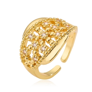 Hollow geometric adjustable gold ring with sparkling zircon stones in a centered top view