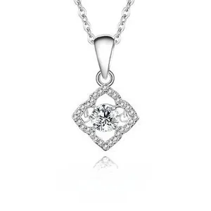 Detail of S925 sterling silver four-petal flower pendant with a sparkling moissanite stone
