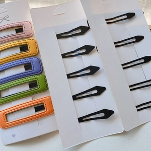 5-piece colorful PU leather and black metal hair clip set for girls on white cards