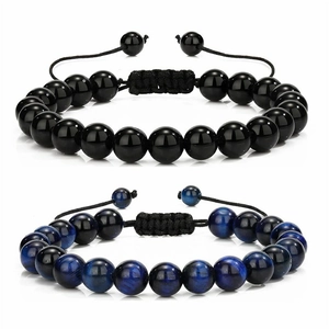 Detail of 8mm natural stone bracelets with black obsidian and blue tiger eye beads