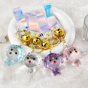 Porte-clés Poupée Chien Transparent en Cristal Pendentif en Acrylique Avec Cloche Dorée Et Ruban Coloré pour Sac à Dos Femme Cadeau