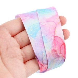 Close-up of marble texture lanyard with pink purple watercolor patterns and gold foil spots
