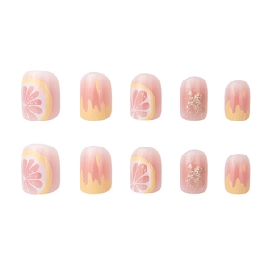 Fresh lemon fruit design press-on nails in pink and yellow with glitter accents