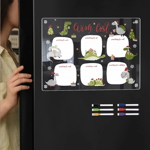 Detail of Christmas acrylic magnetic board on fridge with pens and holiday dinosaur design
