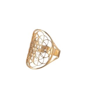 Detail shot of golden hollow flower ring showing intricate Flower of Life geometric patterns