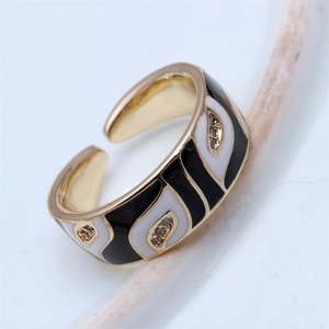 Detail of the evil eye open ring with black and white enamel and micro-inlaid zircons