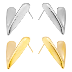 Detailed view of polished heart stud earrings in gold and silver finishes
