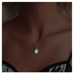 Luminous owl pendant in S925 sterling silver glowing in the dark on a silver chain
