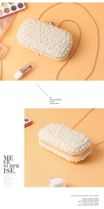 Detail of elegant pearl evening clutch bag with golden chain and bead embroidery