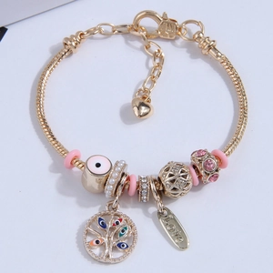 Gold snake chain bracelet with Tree of Life pendant, Evil Eye charm, and LOVE tag