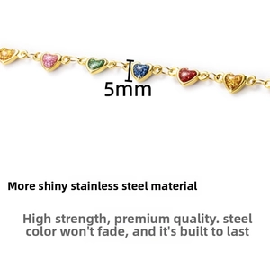 Detail view of gold stainless steel chain with 5mm colorful glitter resin heart charms