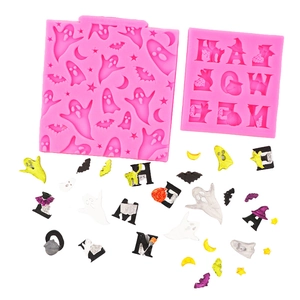 Pink silicone Halloween mold with ghosts, bats, and moon shapes for DIY cake decorating