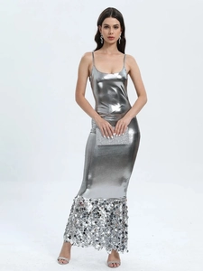 Sleek silver bodycon slip dress with shimmering metallic sequins and luxury fringe detail