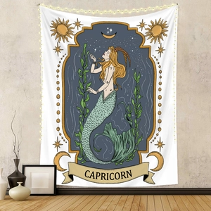 Detail of Capricorn zodiac tapestry with artistic sea-goat illustration and LED string lights