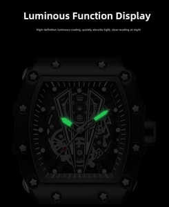 Luminous green glow of watch hands and markers on a hollow barrel-shaped watch