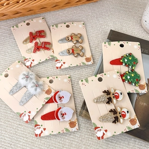 Weihnachts-Haarspangen Set mit Rentier und Weihnachtsmann Motiven für Mädchen