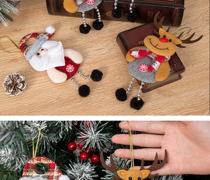 Detailed view of handmade Santa and reindeer felt ornaments with festive plaid patterns