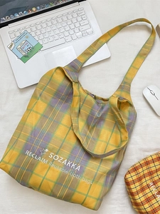 Minimalist embroidered checkered canvas tote bag in yellow and purple plaid pattern