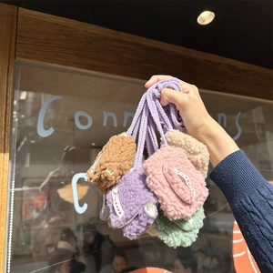 Plush mini earphone storage bags in various colors with braided lanyards for AirPods