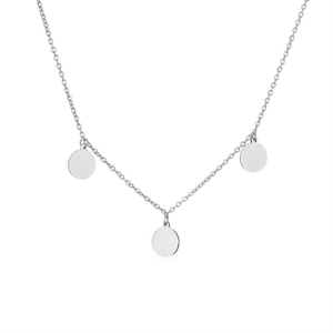 Detailed view of silver necklace with three minimalist circular pendants on white background