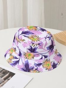 Detail of double-sided floral print bucket hat featuring vibrant purple and orange patterns