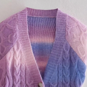 Women's chunky cable knit cardigan with purple and pink gradient tie-dye effect