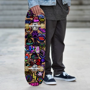 Skateboard bottom decorated with vibrant neon-style waterproof graffiti stickers