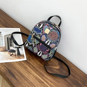 Fashionable mini backpack with multicolor snakeskin print and durable golden hardware
