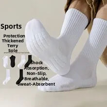 Detail of white cotton sports socks with thickened cushioned sole and breathable fabric