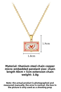 Detail of gold titanium steel necklace featuring a pink and white enamel heart pendant