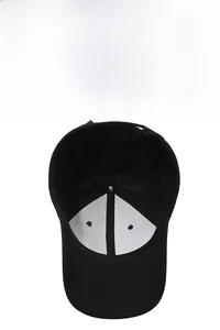 Detail view of the breathable inner structure and white lining of this black baseball cap