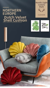 Detailed texture of shell-shaped velvet pillows in various colors on a modern sofa