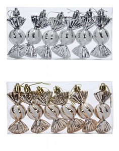 Detail view of 6-piece silver and champagne candy-shaped Christmas tree ornaments in a box