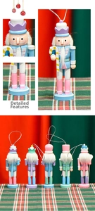 Detail view of 13cm macaron wooden nutcracker soldiers with festive hanging strings