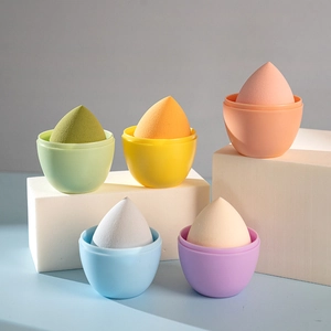 Set of 5 colorful teardrop makeup sponges in portable storage cases for blending
